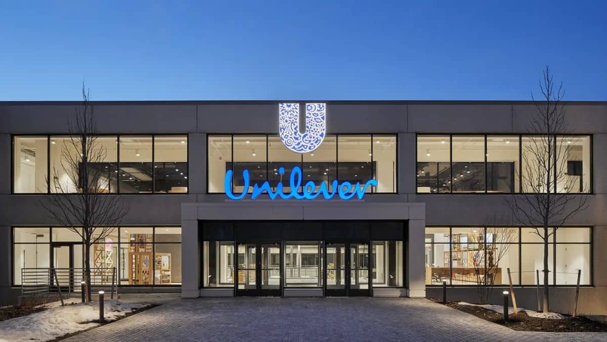 A building structure displaying a UNILEVER sign prominently at its front top